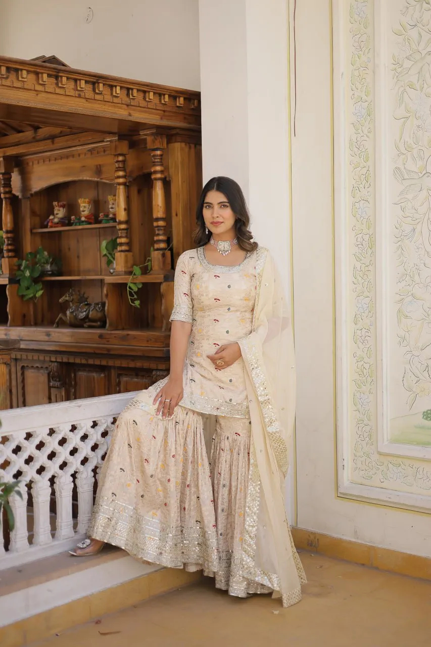Viscose Jacquard Sequined Off White Kurti with Embroidered Sharara & Russian Silk Dupatta